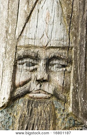 face of hero, glyphic on wood