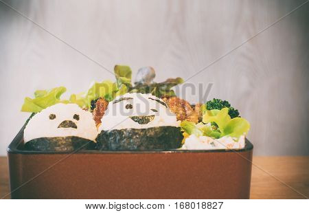 Japanese Bento with cartoon character in vintage tone