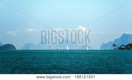 Sailing ships on the horizon. Ships far on the horizon