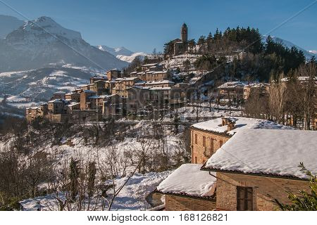 Montefortino medieval village with Sibillini mountains in the background