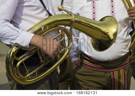 Traditional Serbian trumpeters in national costume in folk festival