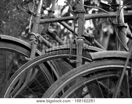 ABSTRACT SHOT OF OLD RUSTY BICYCLE PARTS