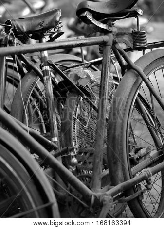 ABSTRACT SHOT OF OLD RUSTY BICYCLE PARTS