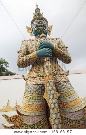 The evil Buddhist statue costs in the light of setting the sun