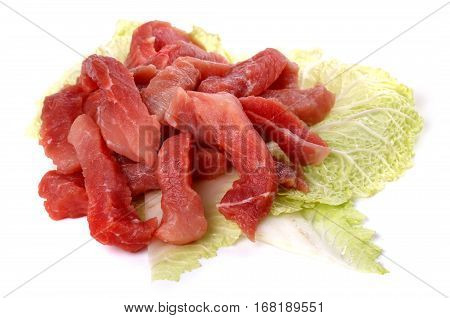 Raw Sliced Meat On A Cabbage Leaf