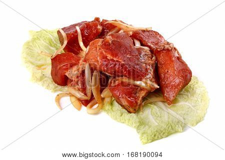 Raw Sliced Meat On A Cabbage Leaf