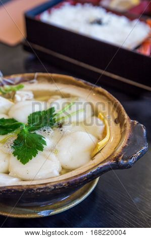 Traditional Shimabara Guzoni - Soup With Rice Cake And Seafood