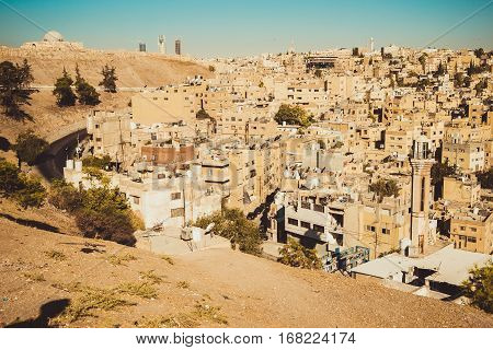 Photo of the Amman city view with Umayyad Palace on background. Urban landscape. Residential area. Arabic architecture. Eastern city