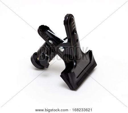 black tripod clamp isolated on white background