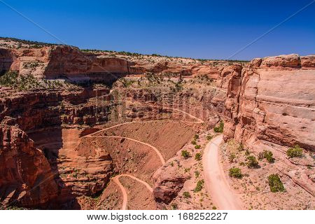 Winding Shafer Trail road in Canyonlands national park, Moab Utah USA