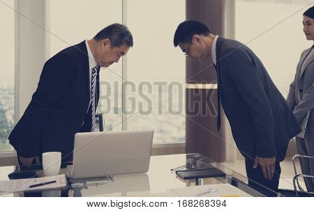 Business Partners Introductionary Handshake Bow