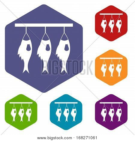 Three dried fish hanging on a rope icons set rhombus in different colors isolated on white background