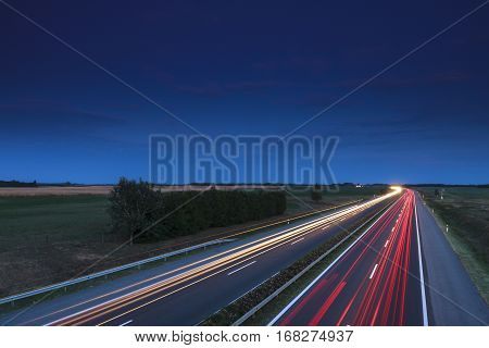 Cars Speeding On A Highway