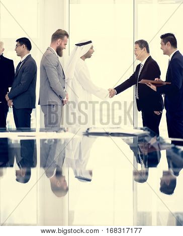 Business Partners Introductionary Handshake Bow