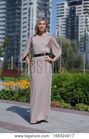 beautiful young woman posing outdoors 