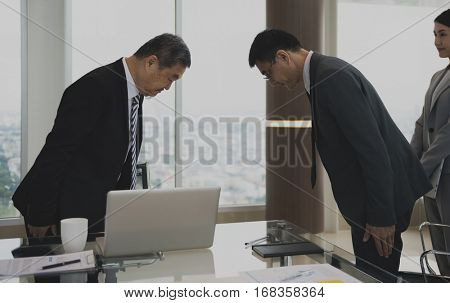 Business Partners Introductionary Handshake Bow