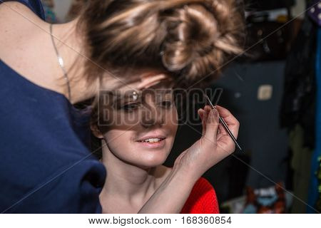 Make-up Artist Doing The Make-up For Nice Girl