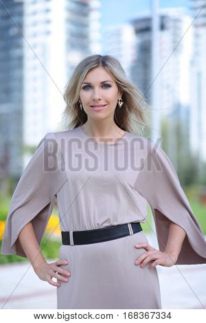 beautiful young woman posing outdoors 