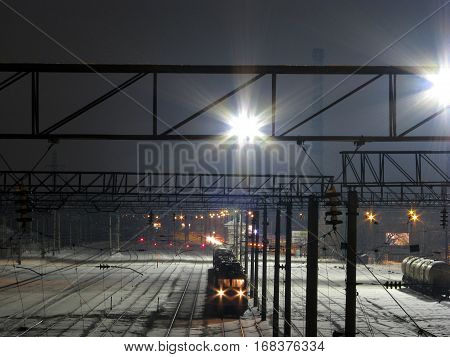 railway station covered with snow against the sky