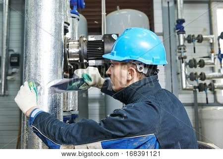 industrial worker at insulation work