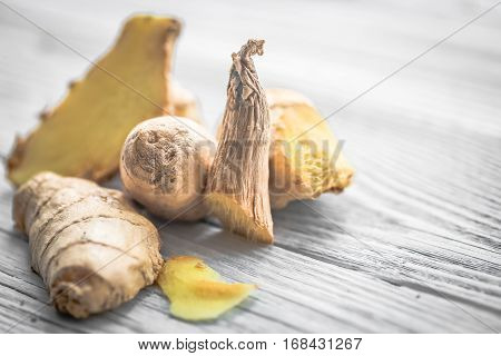 Ginger On Wooden Background