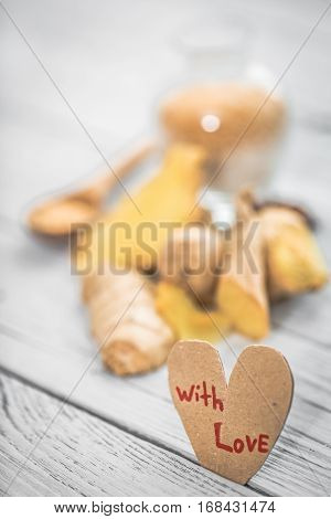 Ginger On Wooden Background