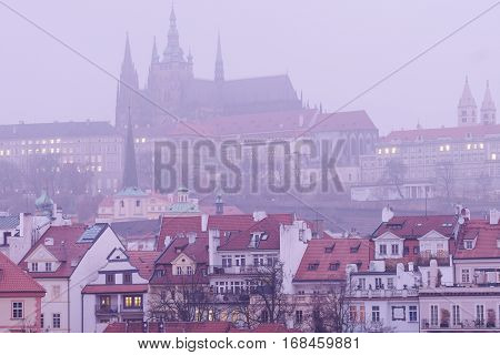 Prague, Czechia - November, 21, 2016: Panorama of an old Prague, bridges and embankment of Vitava river, Czechia in a night