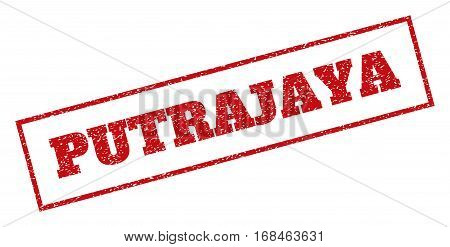 Red rubber seal stamp with Putrajaya text. Vector message inside rectangular shape. Grunge design and dirty texture for watermark labels. Inclined emblem.