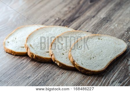 Fresh bread on wood background Apartment will post pictures of bread on a wooden Board.