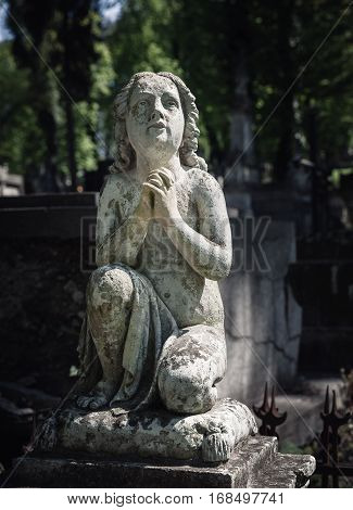 Old Statue On Grave In Lviv