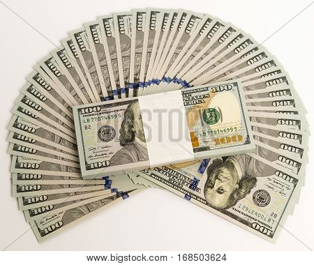 Stack of money in US dollars in cash in hundred dollar bills