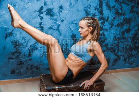 Muscular fitness woman, healthy lifestyle, Cross fit bodybuilder, athletic woman's body, close up of young woman with barbell flexing muscles