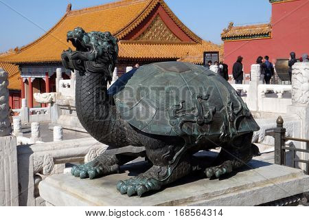 BEIJING, CHINA - FEBRUARY 23, 2016: Bronze turtle in the imperial palace which stands for power and long life, Forbidden city in Beijing, China on February 23, 2016.