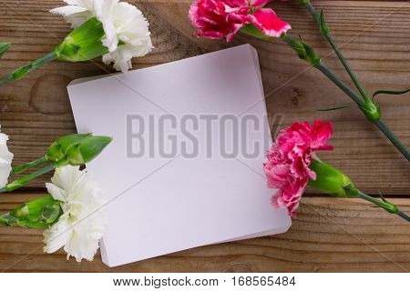 Flowers And Piece Of Paper