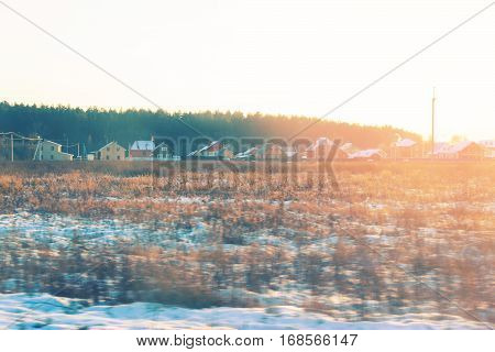 beautiful winter landscape. cottages in a sunlight