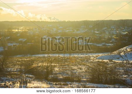 beautiful winter landscape. cottages in a sunlight