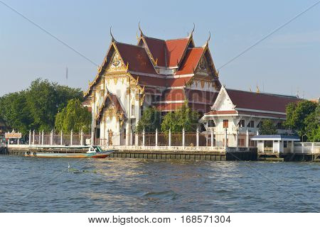 BANGKOK, THAILAND - DECEMBER 12, 2016: Wat Rakhang Khositaram Woramahawiharn on the Chao Phraya river