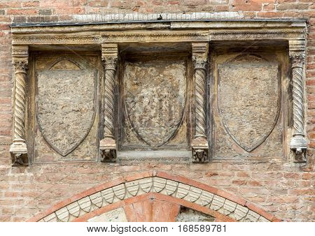 Coat of arms on the Palazzo della Ragione . Mantua Italy