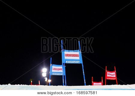 STOCKHOLM SWEDEN - JAN 31 2017: Blue and red slalom gates and black sky in the parallel slalom event at the Alpine Audi FIS Ski World Cup - city event January 31 2017 Stockholm Sweden
