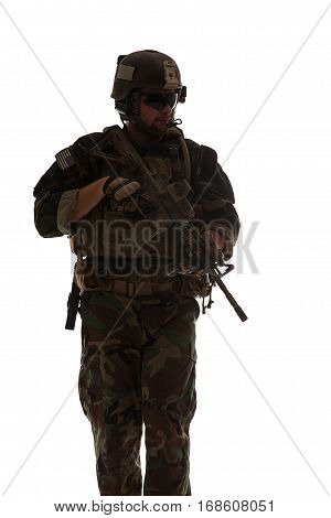 United states Marine Corps special operations command Marsoc raider with weapon. Studio shot of Marine Special Operator white backgroun