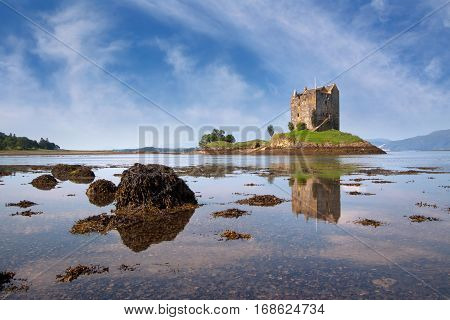 Castle Stalker, Appin, Argyll, Scotland is a well-preserved medieval tower-house situated on a tidal islet on Loch Laich. Founded around 1440 the castle has variously been associated with the Clans of MacDougall, Stewart and Campbell.