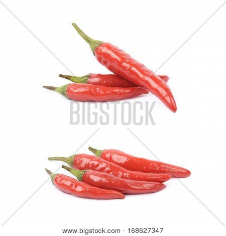 Pile of red italian peppers isolated over the white background, set of two different foreshortenings