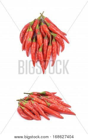 Pile of red italian peppers isolated over the white background, set of two different foreshortenings