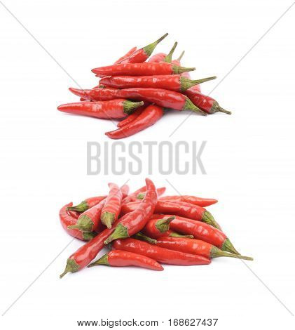 Pile of red italian peppers isolated over the white background, set of two different foreshortenings
