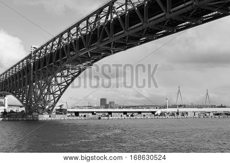 Black and White Minato Bridge in Osaka sea port skyline Japan