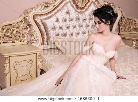 Gorgeous Bride With Dark Hair In Luxuious Wedding Dress