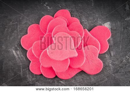 red and pink hearts on grey background