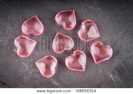 red and pink hearts on grey background