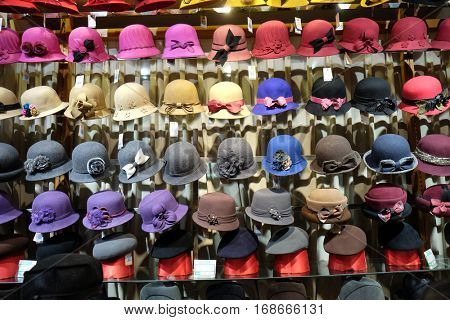 BEIJING - FEBRUARY 22: Hats in the store on the Qianmen street, a famous old shopping street over hundreds years in Beijing, China, February 22, 2016.