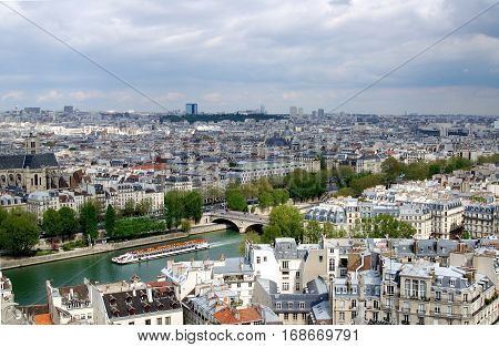 Panorama of Paris France. Daytime with white clouds.